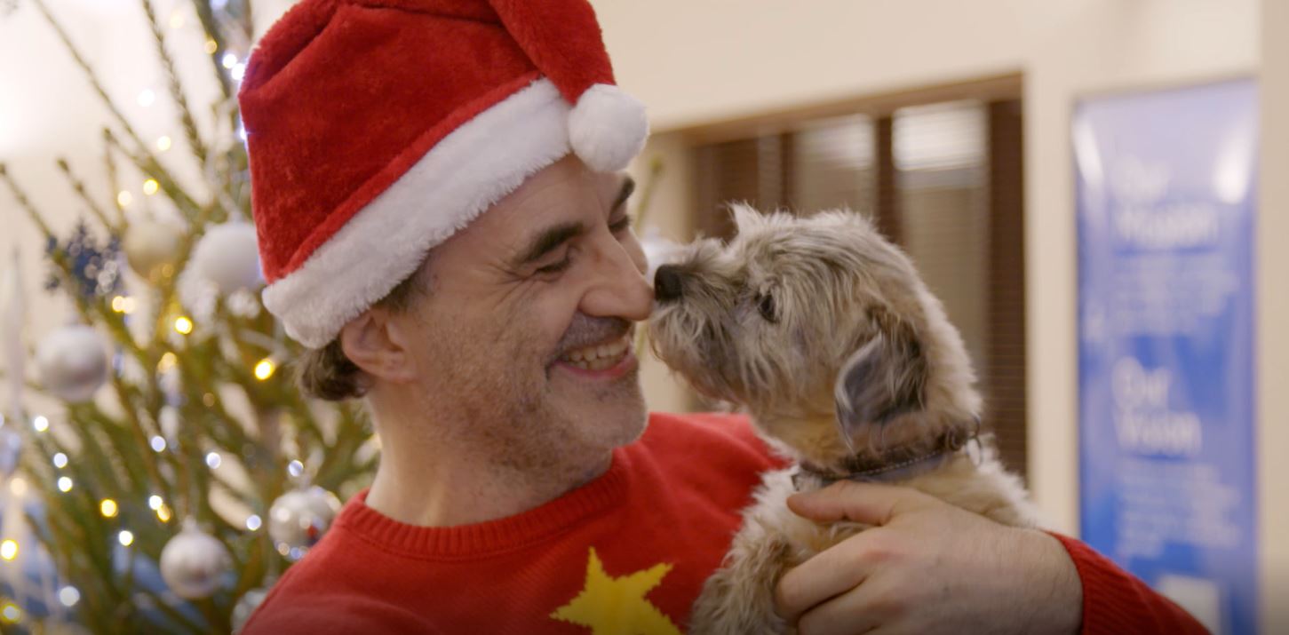 Noel Fitzpatrick and Border Terrier Keira at Christmas